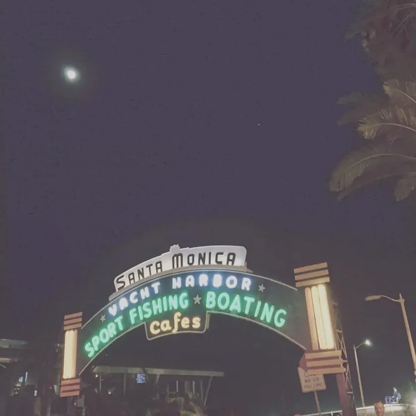 The Santa Monica Yacht Harbor sign at night